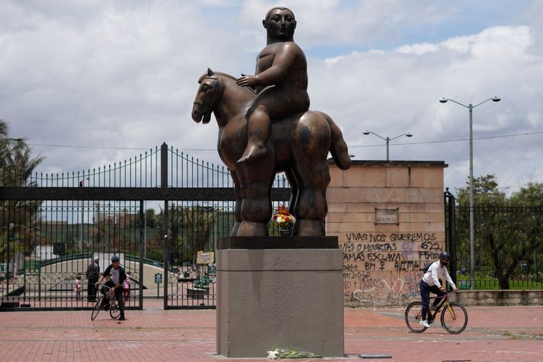 woman on horse statue
