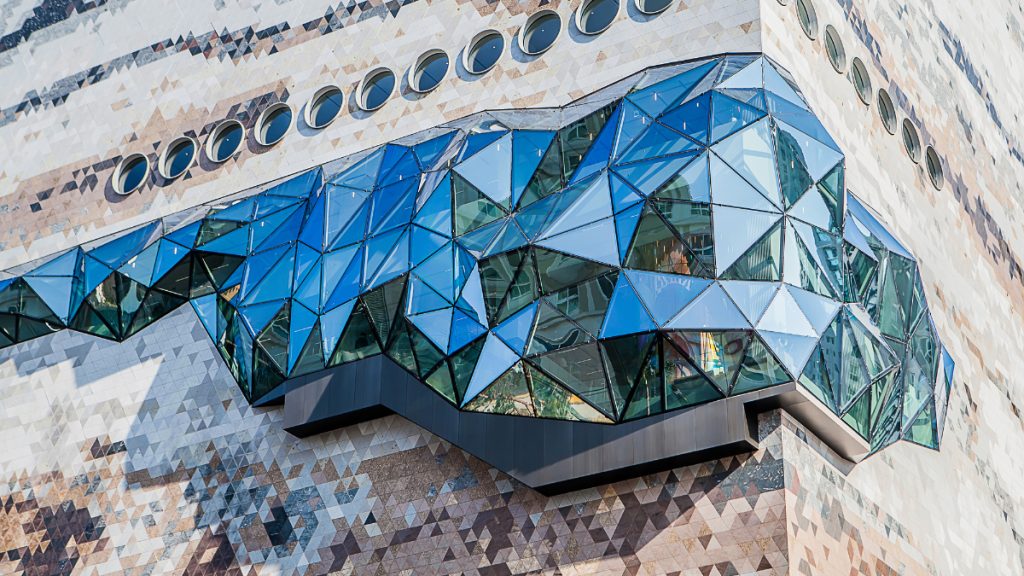 Faceted glass structure building exterior