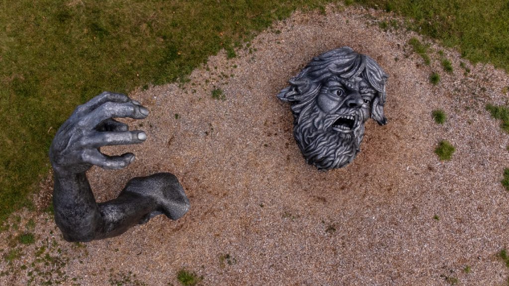 Large fragmented human figure sculpture