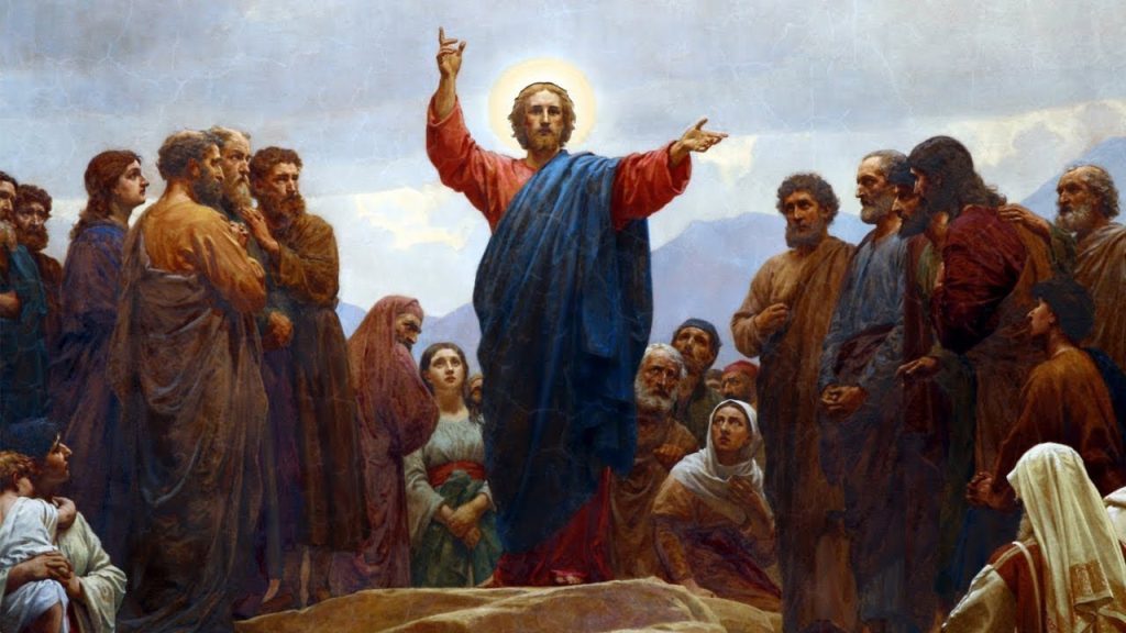 Jesus teaching a crowd of followers on the hillside