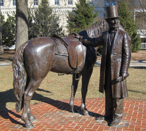 Symbolism of Clothing and Pose in Lincoln Sculptures